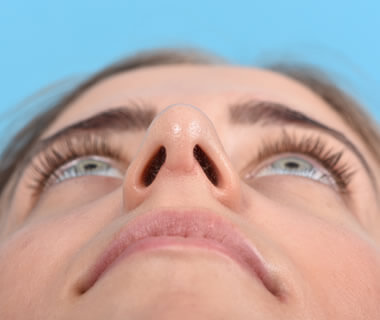 The girl's face seen from below